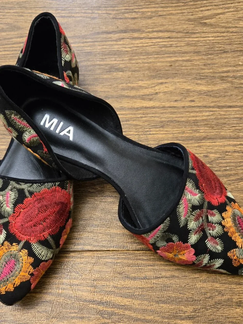 MIA Caroline Floral Embroidered d'Orsay Pointed Toe Flats on Black Background